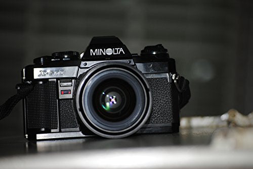 refurbished Minolta X-570 SLR Camera With A 50mm f/1.7 Lens